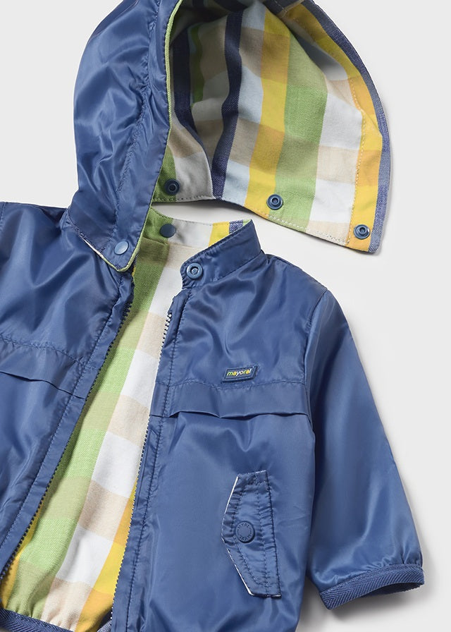 Reversible windbreaker, cerulean, close up.