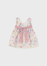 Baby floral dress with tulle sash, back.