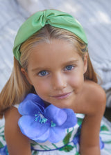 Girl Wearing Intertwined Headband, Apple