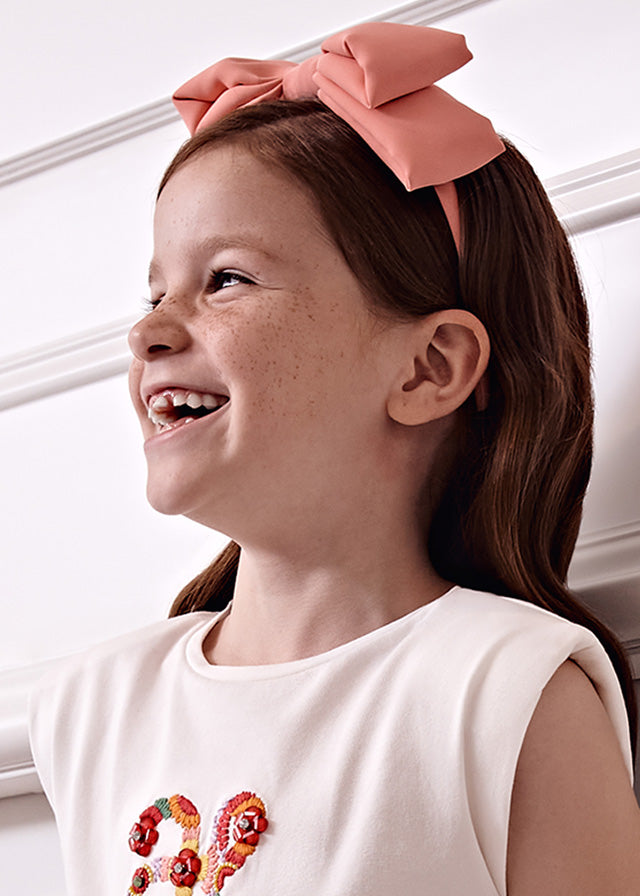 Girl Wearing Bow Crepe Headband