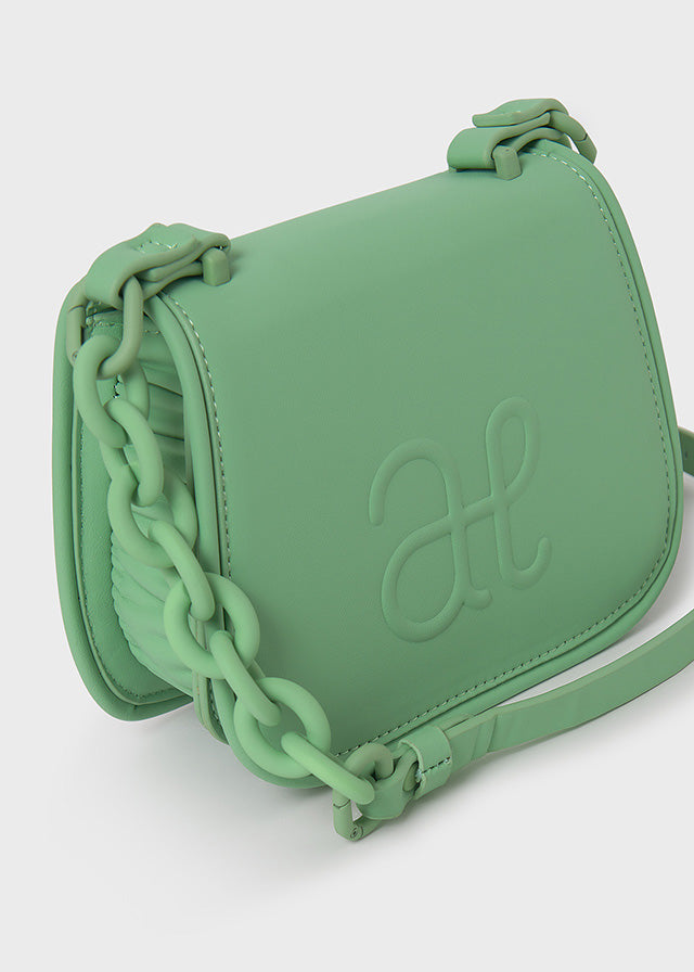 Abel & Luna embossed logo bag in apple. Side.